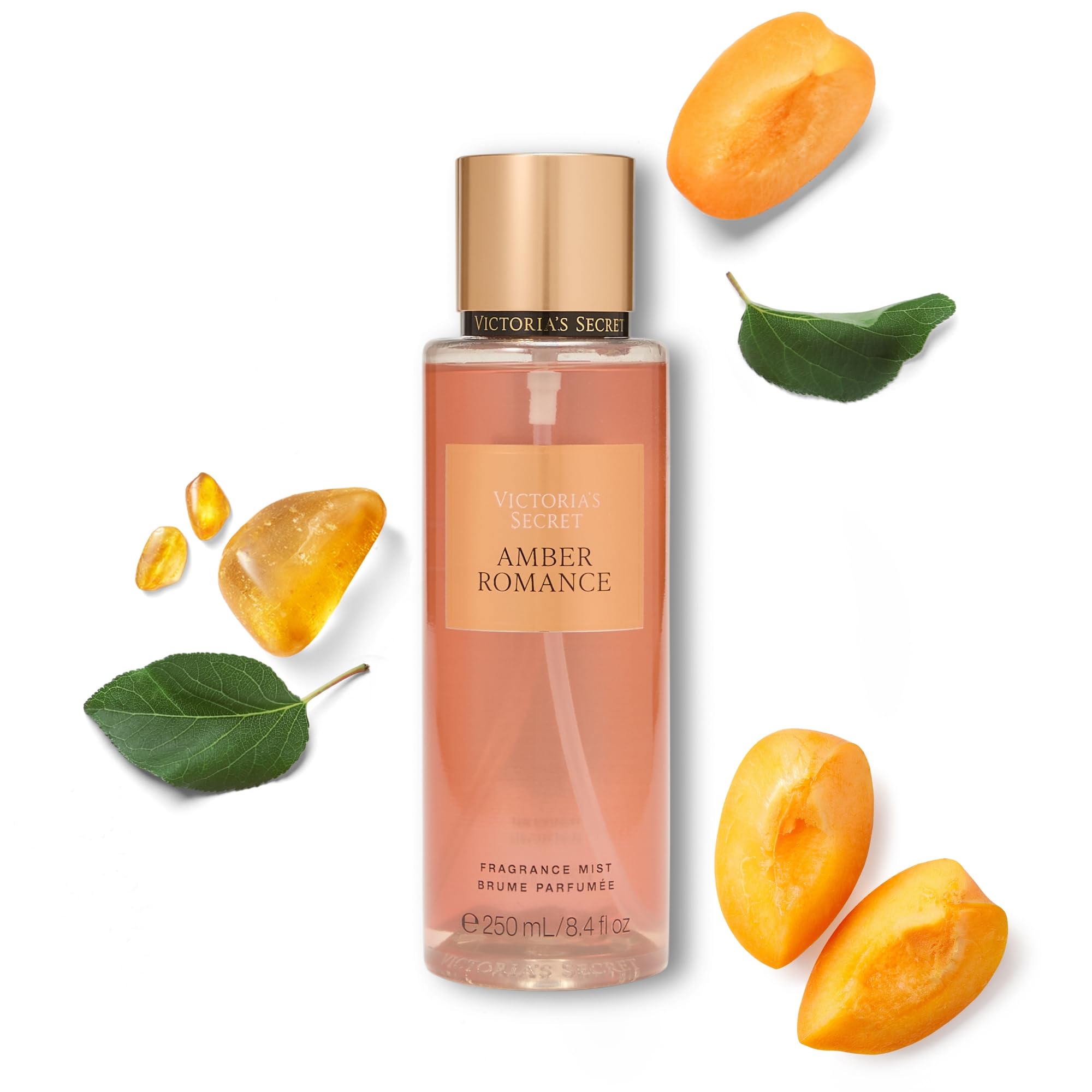 Amber Romance Mist spray-action showing quick fragrance release