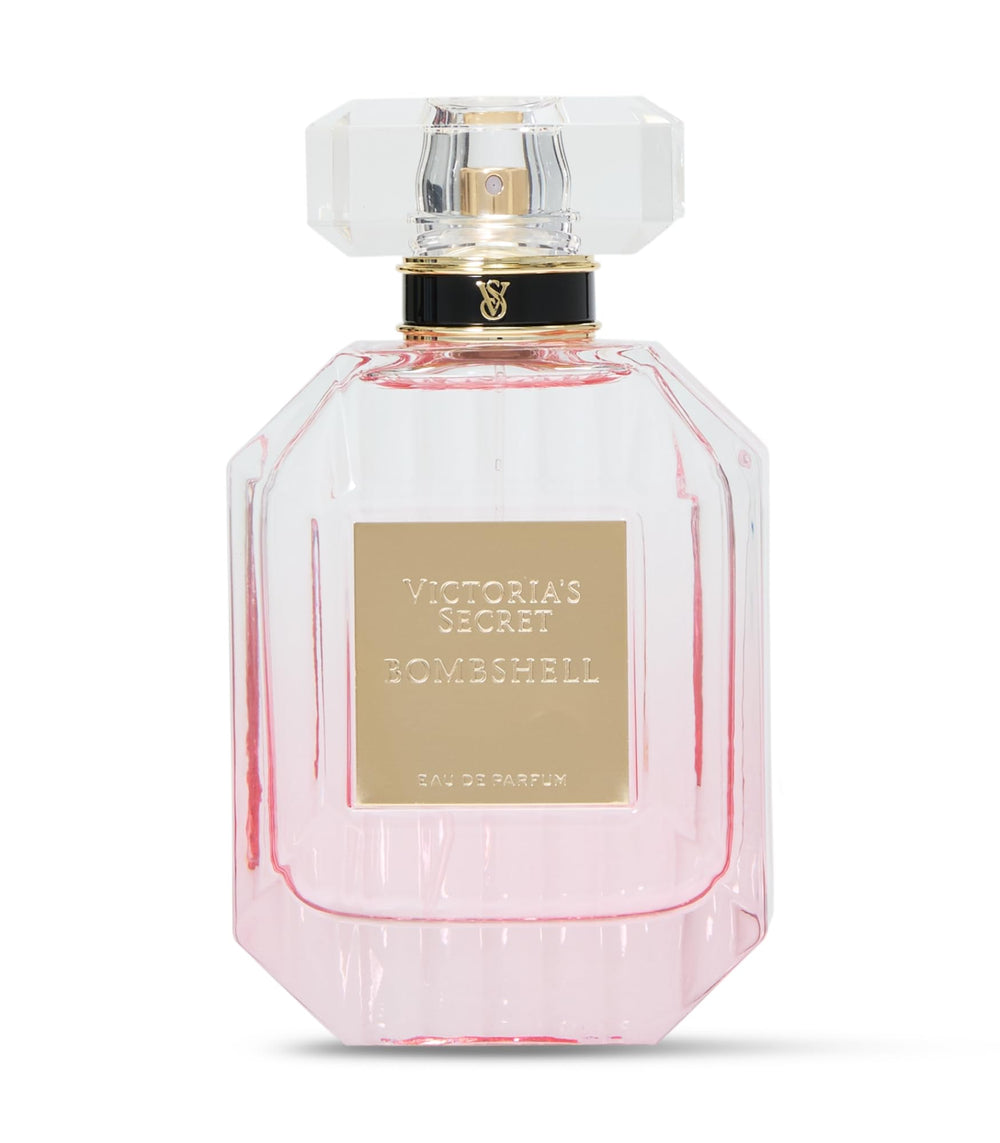 Victoria's Secret Bombshell bottle closeup, premium glass shine for gifts.