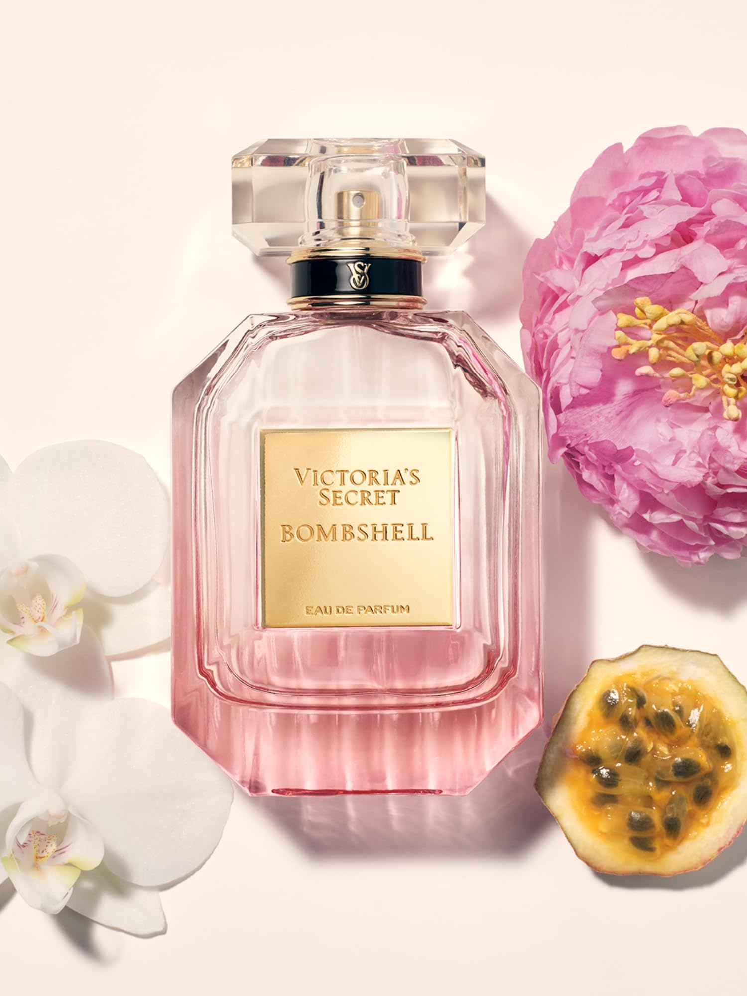 Victoria's Secret Bombshell bottle side, sleek vanity display.