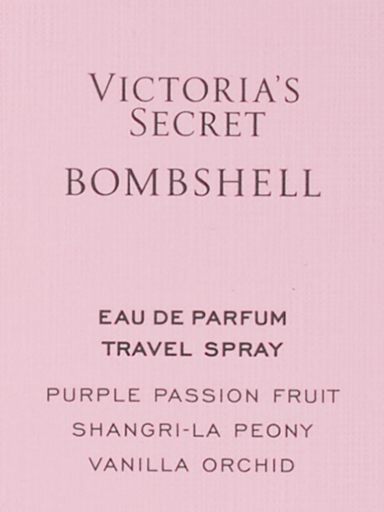 Victoria's Secret Bombshell travel-friendly size fits purse for touch-ups.