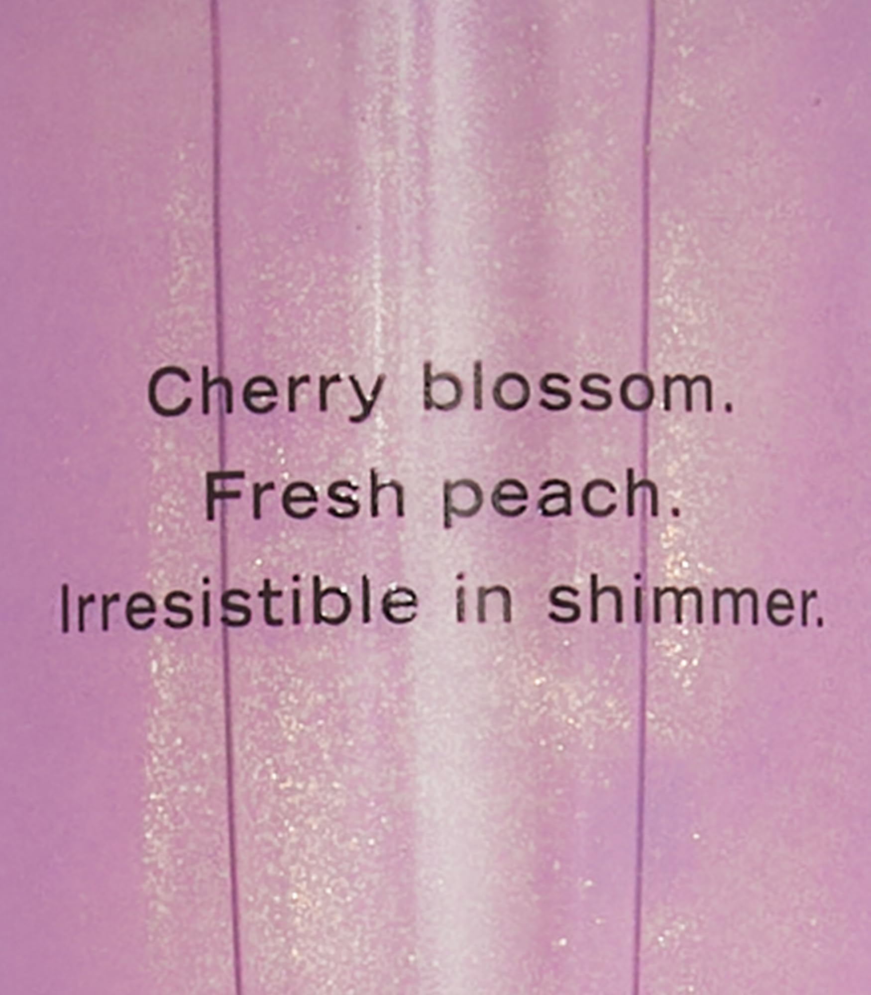 Victoria's Secret Love Spell Shimmer Mist spray capturing a light mood-boosting fragrance for daily wear.