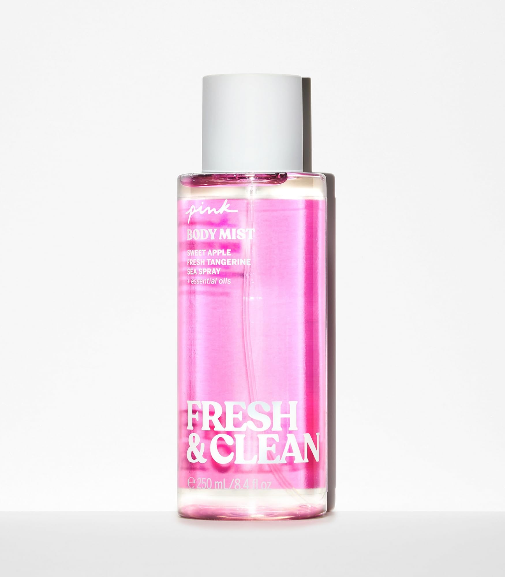 Victoria's Secret Pink Fresh & Clean spray in hand for quick refresh.