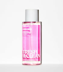 Victoria's Secret Pink Fresh & Clean spray in hand for quick refresh.