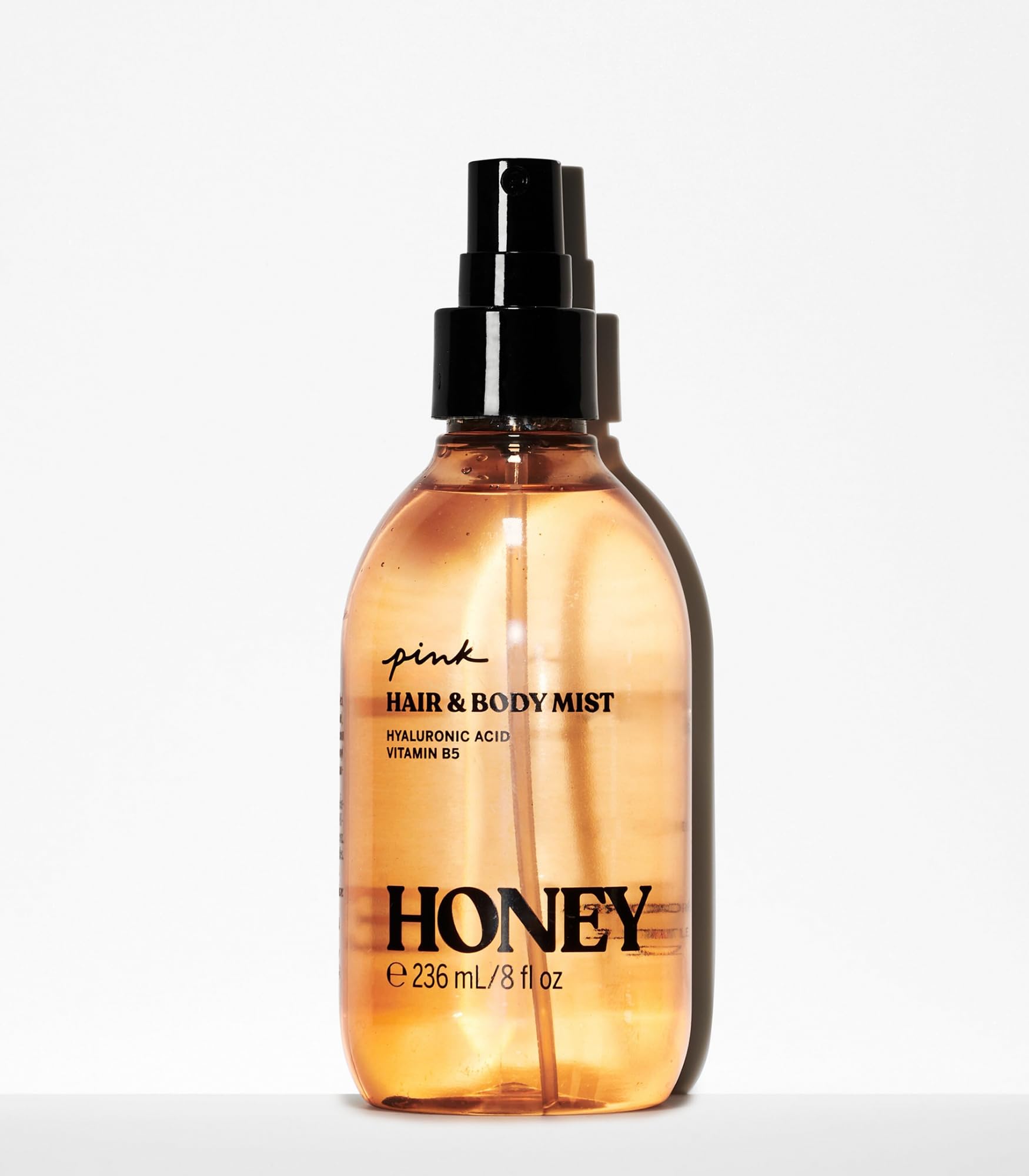 Victoria's Secret PINK Honey mist close-up shows feather-light spray.