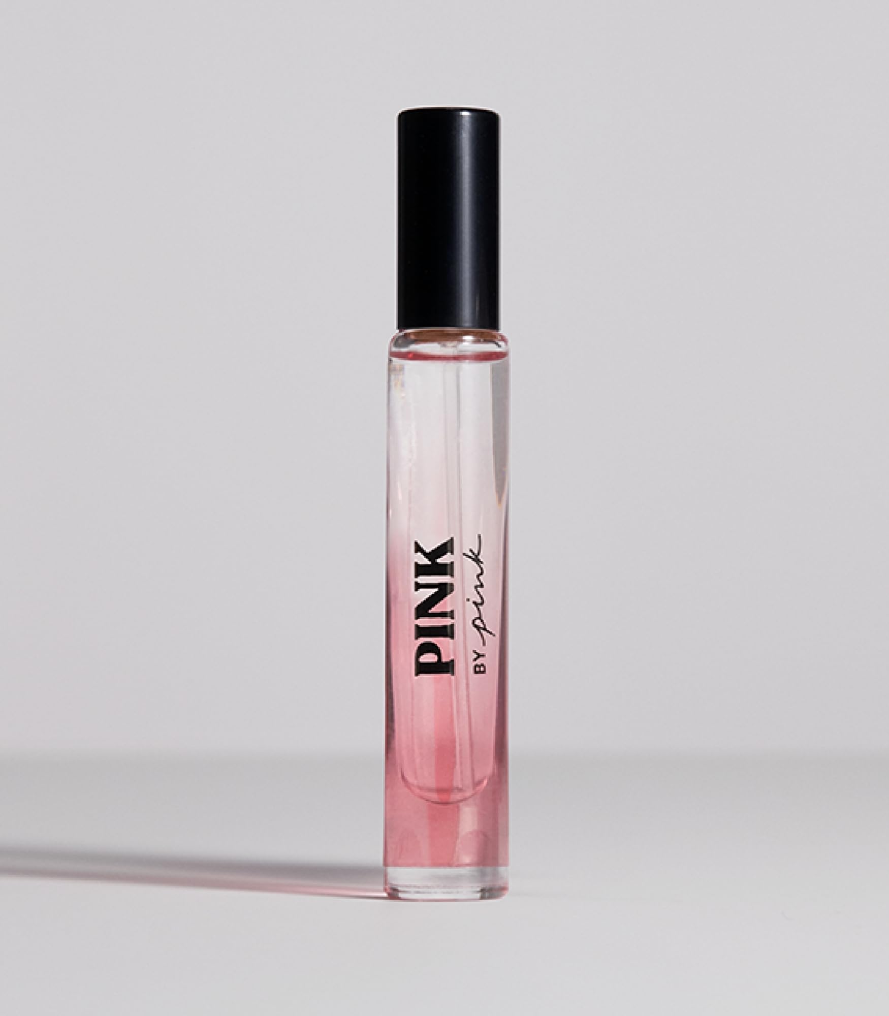 Pink travel spray purse-size cap view for easy on-the-go fragrance touch-ups
