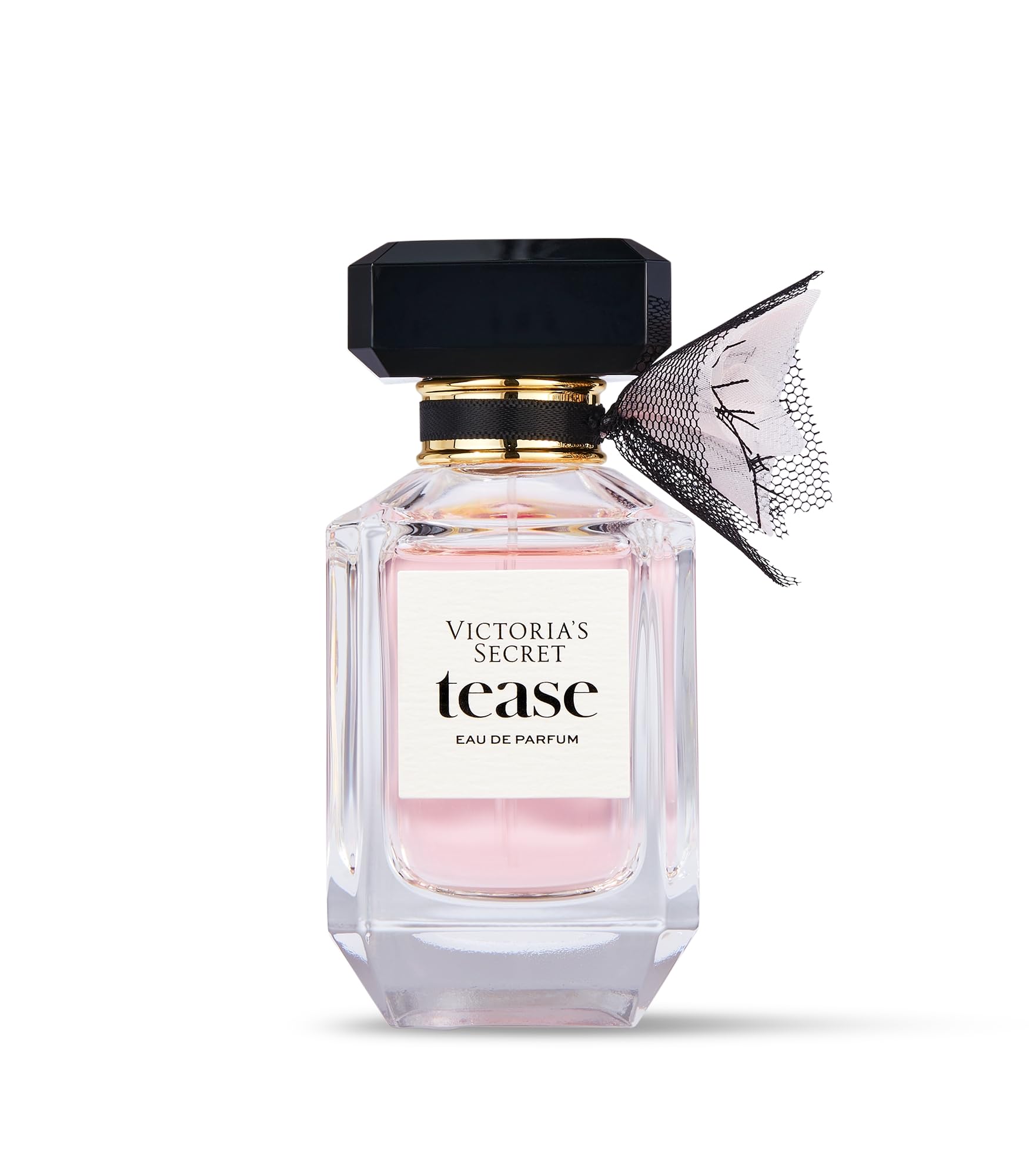 Victoria's Secret Tease bottle closeup, rich vanilla notes for date-night allure.