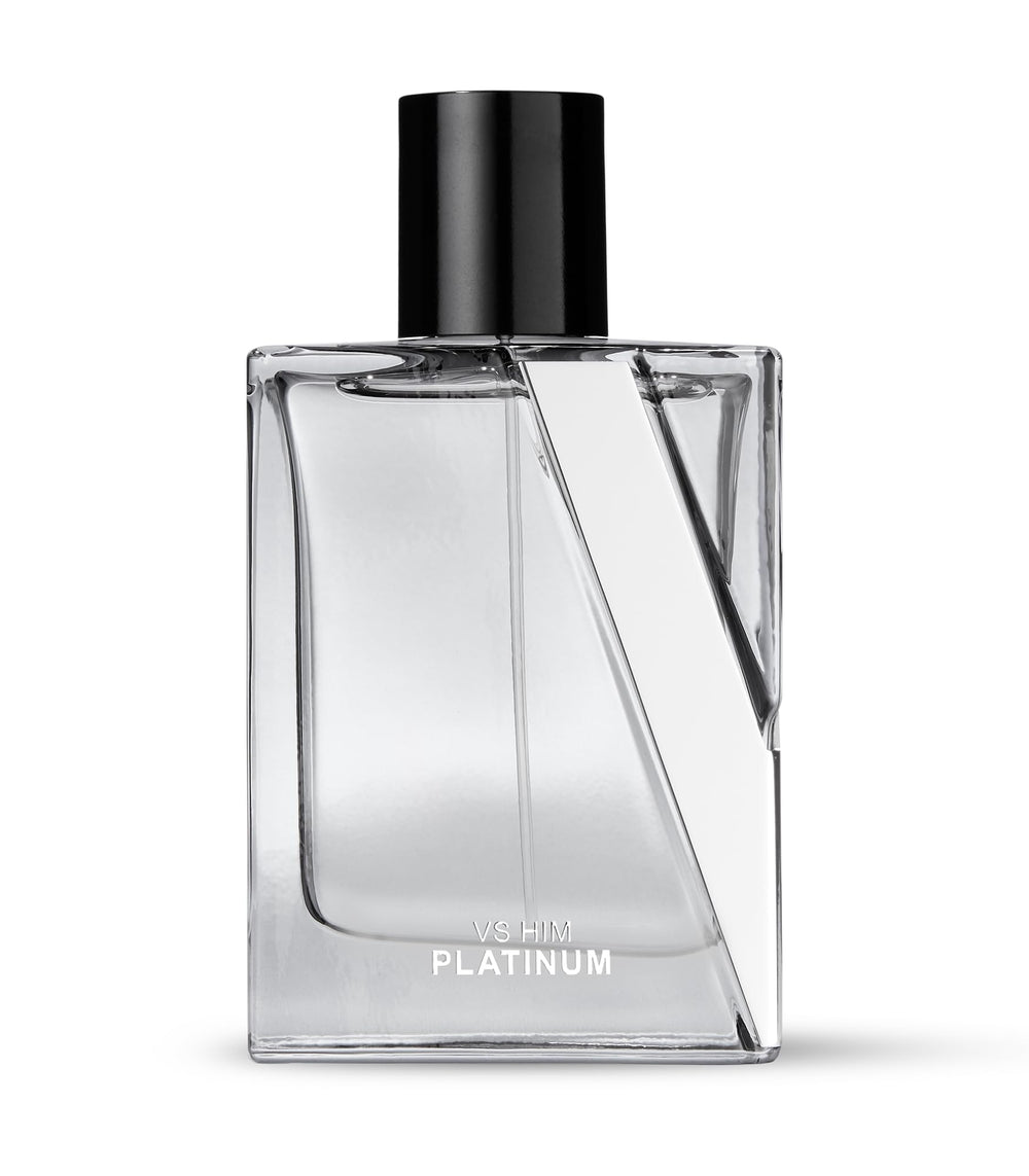 Victoria's Secret VS Him Platinum bottle close-up reveals woody notes and pepper warmth.