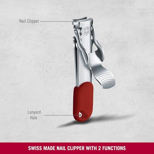 Victorinox red nail clipper in hand demonstrating compact pocket size.