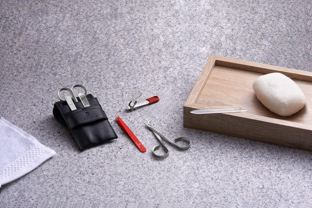Travel-ready Victorinox red nail clipper fits in pocket or bag.