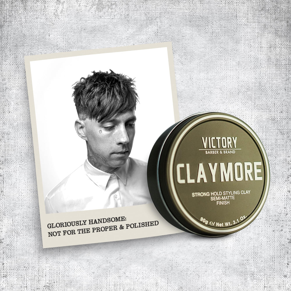 Model shows matte finish on textured hair after using Claymore.