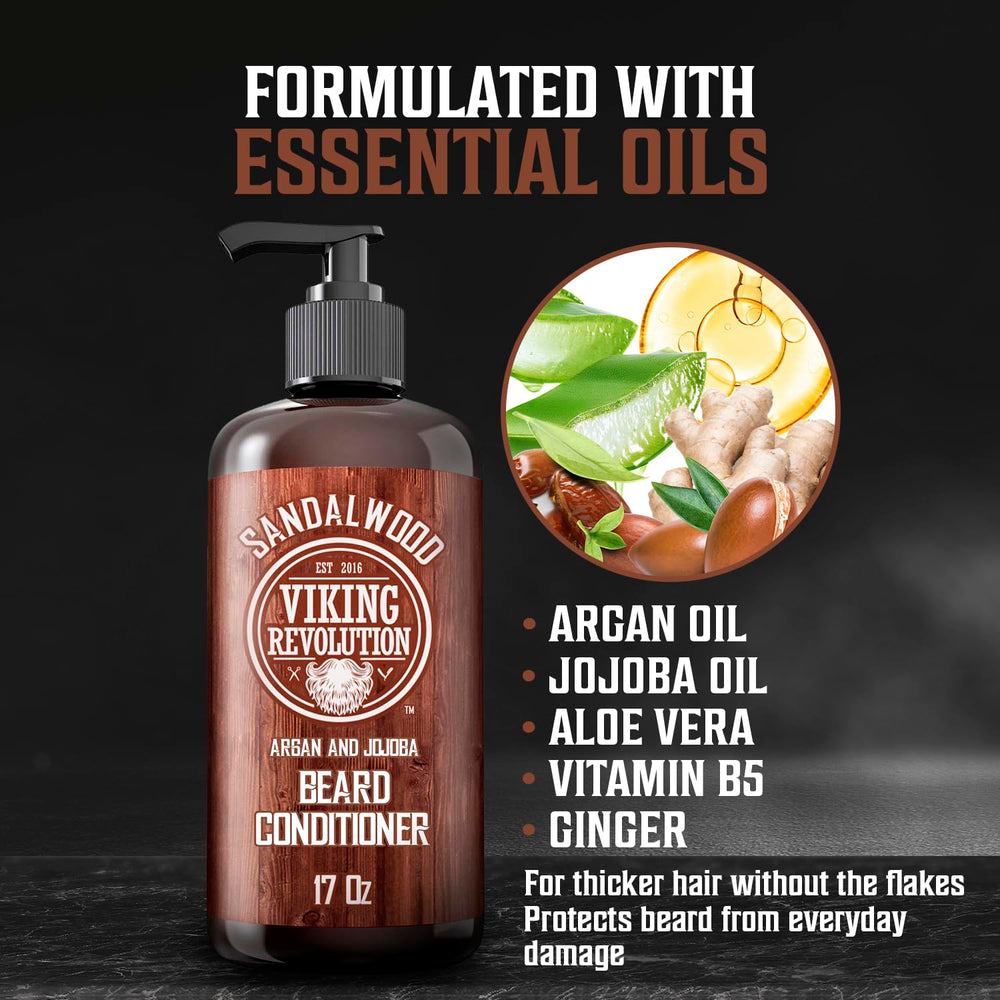 Viking Revolution applying conditioner to beard for deep moisturization.