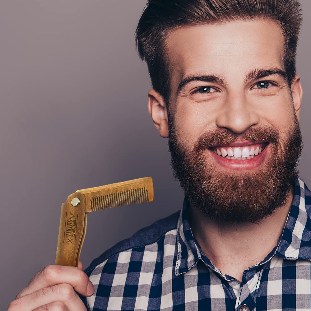 Viking Revolution folding-beard-comb-in-use for detangling and oil application.