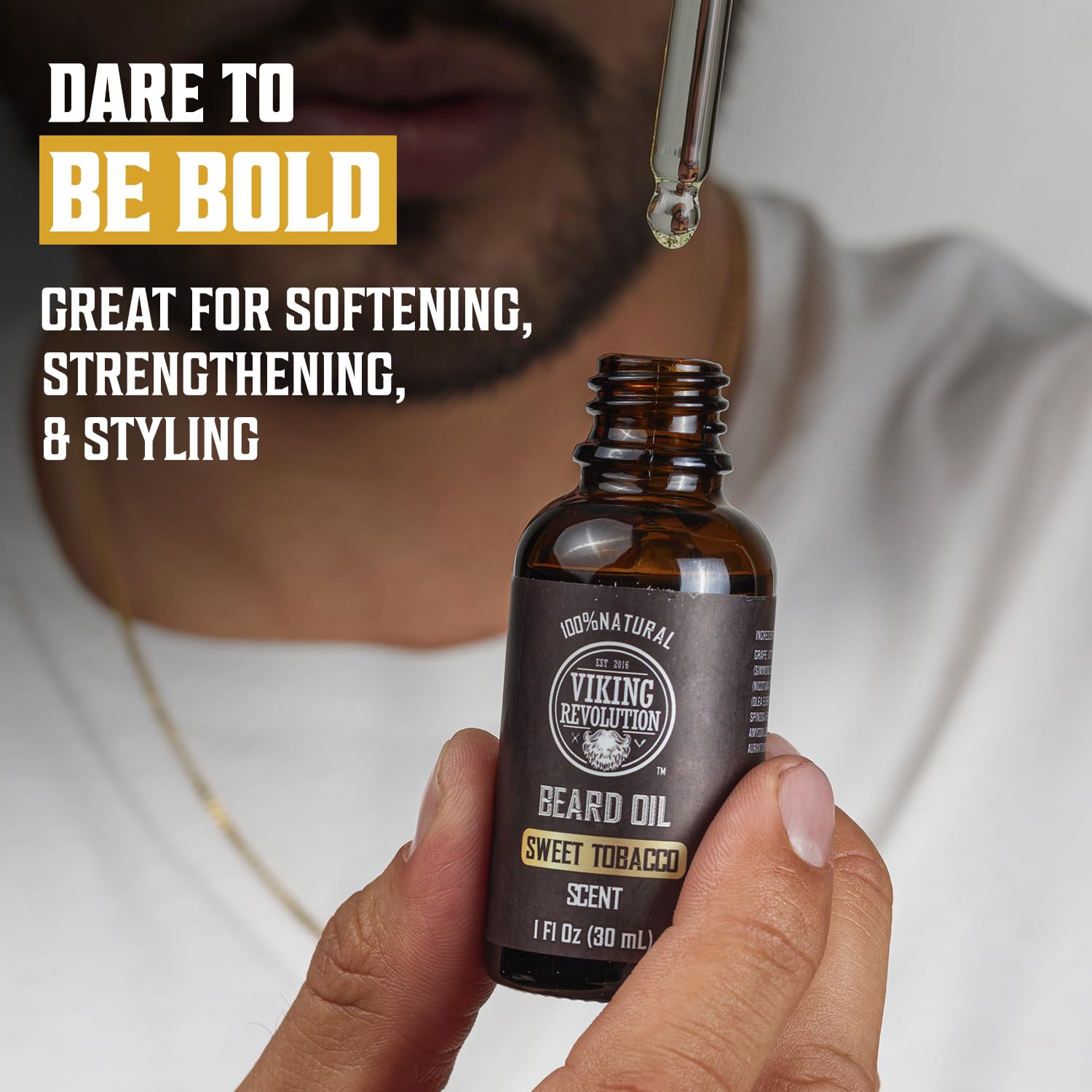 Close-up of Viking Revolution beard oil bottle highlighting packaging and aroma.