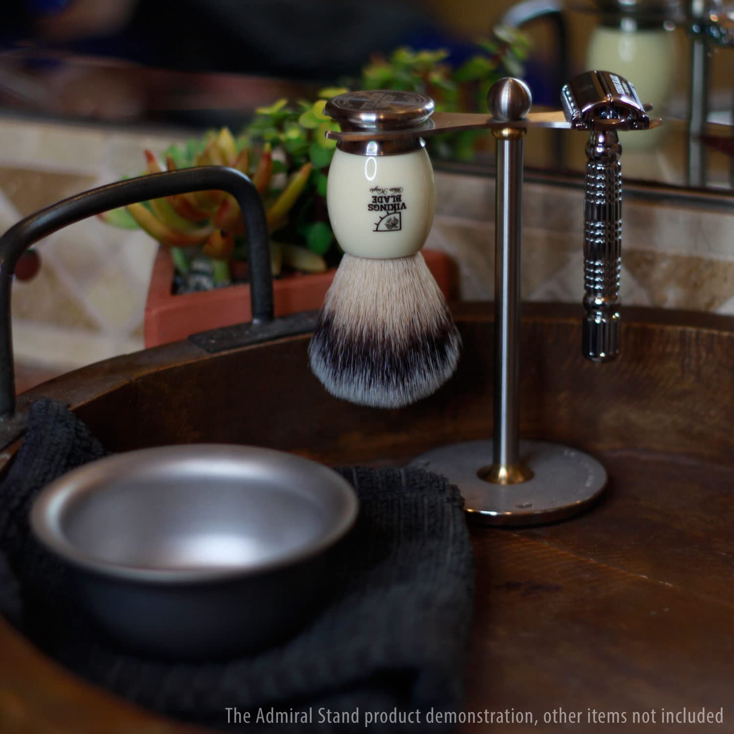 Vikings Blade Admiral stand showcased with shaving set, premium grooming ensemble