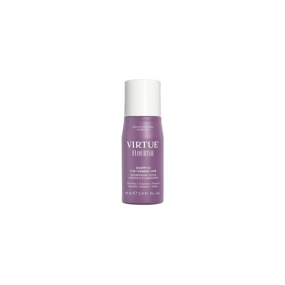 Virtue Flourish shampoo bottle on a clean vanity for color-safe care.