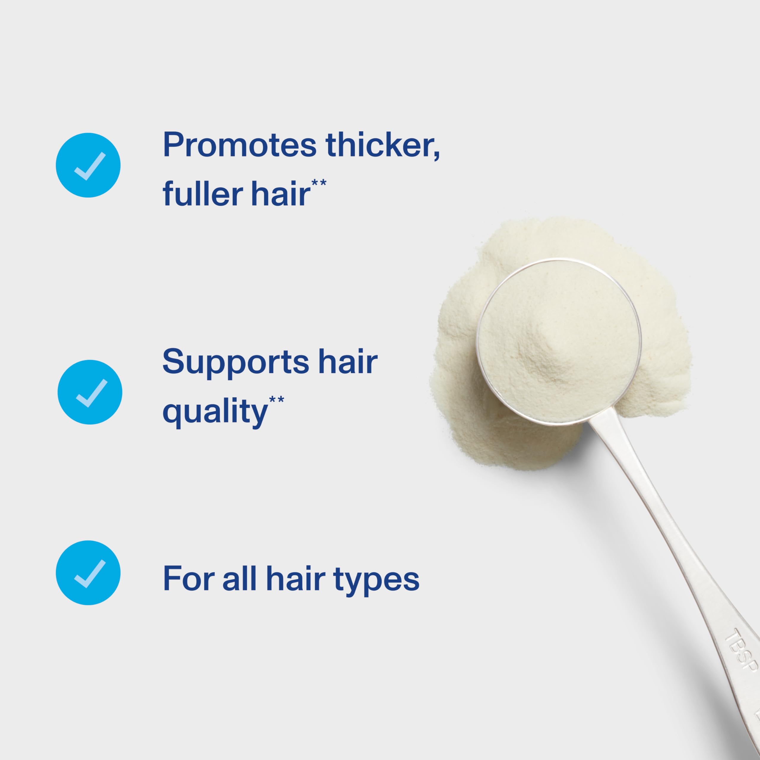 Close-up of daily dose scoop for Hair Complex on a kitchen surface.