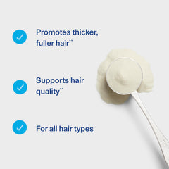Close-up of daily dose scoop for Hair Complex on a kitchen surface.