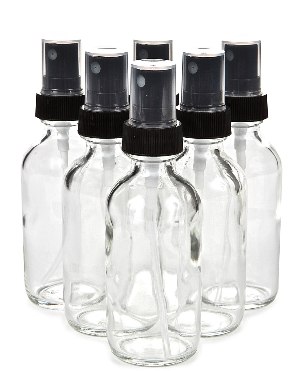 Vivaplex 6-pack 2 oz clear glass bottles with black mist sprayers offer travel convenience.