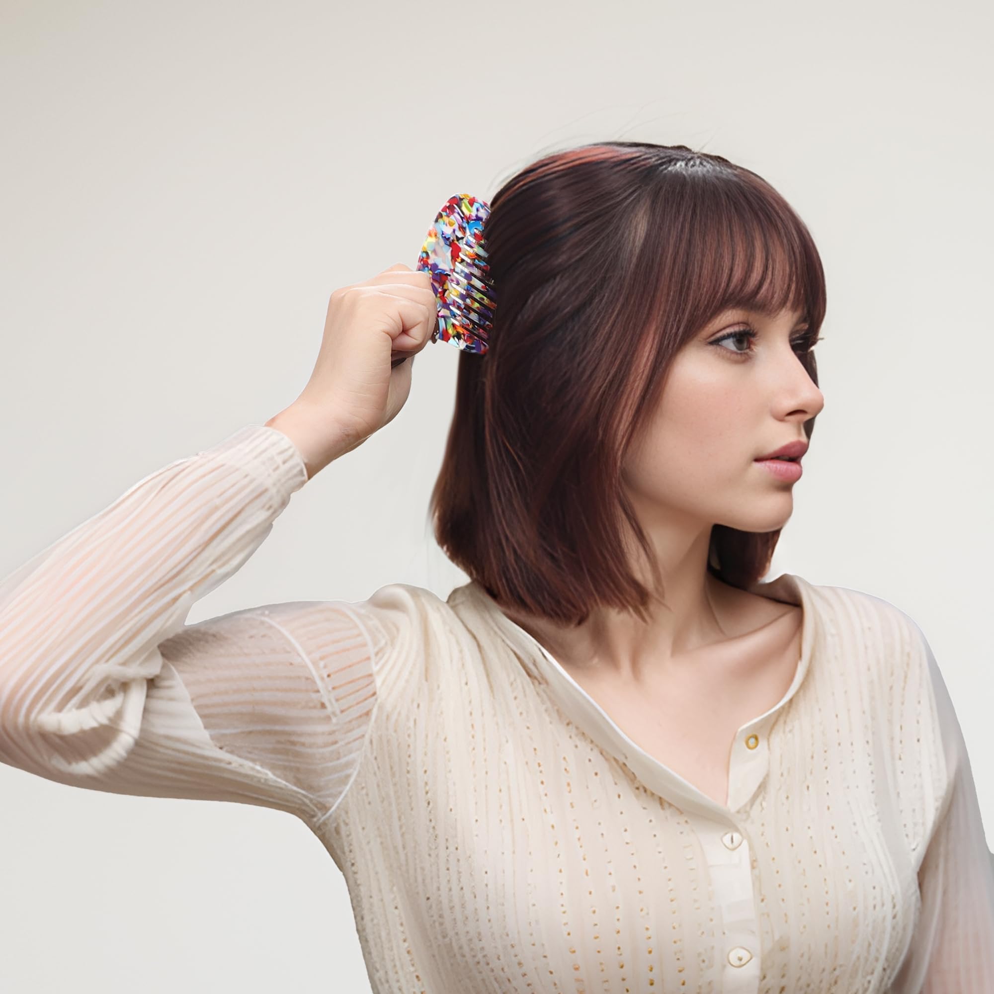 VOCOSTE pocket-size travel comb fits in a purse for quick touch-ups.