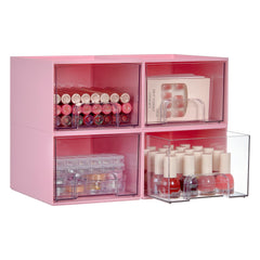 Vtopmart pink makeup organizer 4-pack on vanity keeps cosmetics neatly organized.