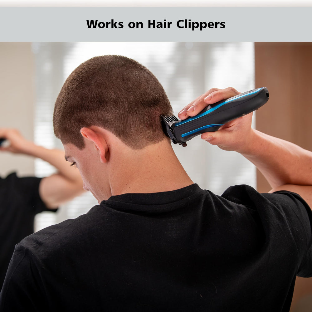 Professional salon use with Wahl oil visible on clipper blades