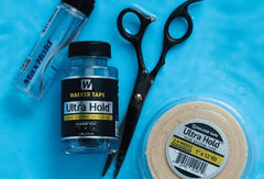 Application demo featuring Walker Tape No Shine adhesive demonstrates secure bond on a hairpiece.
