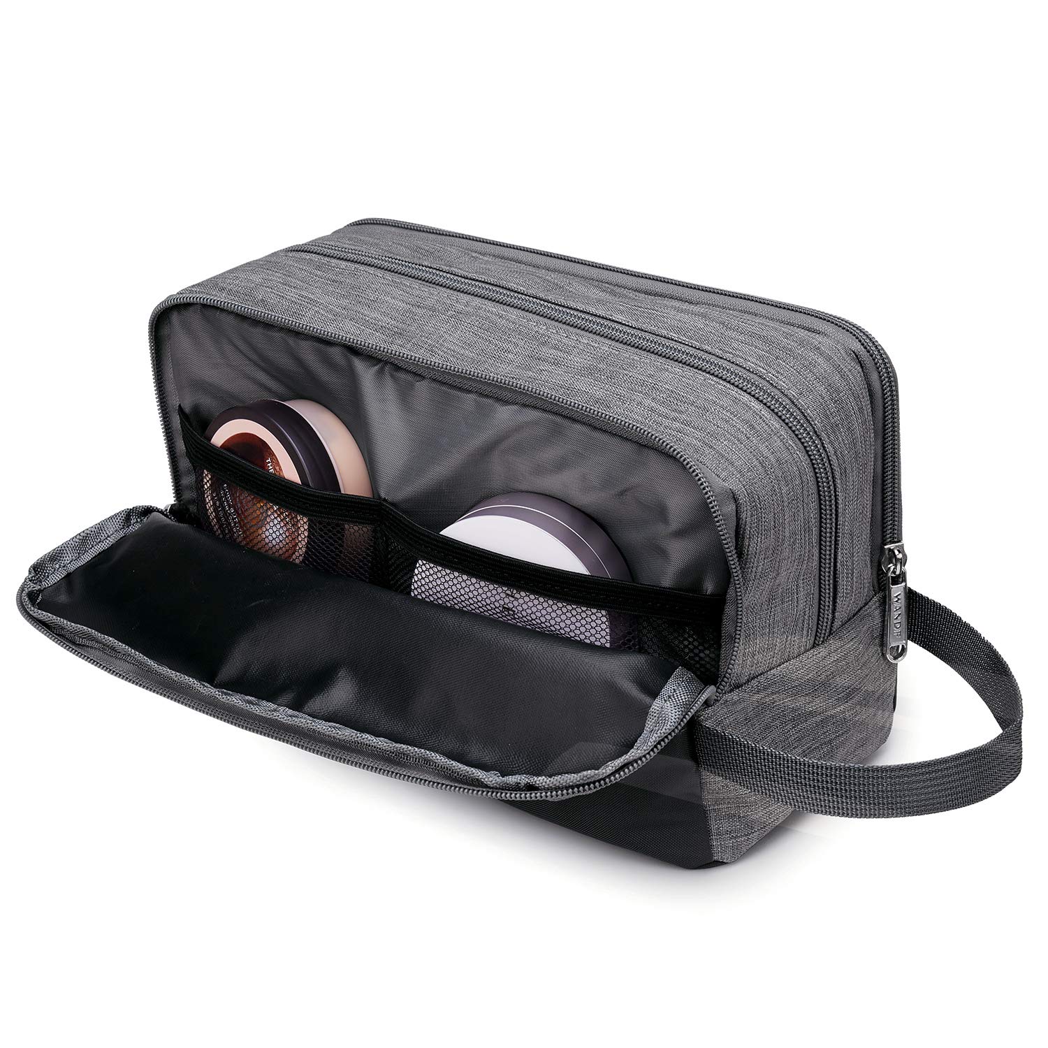 WANDF toiletry bag in travel setup ready for quick access at hotel.