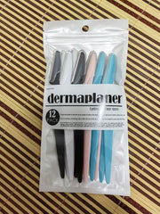 WANGFXWA DermaPlane Razor in white for clean lines and smooth skin prep.