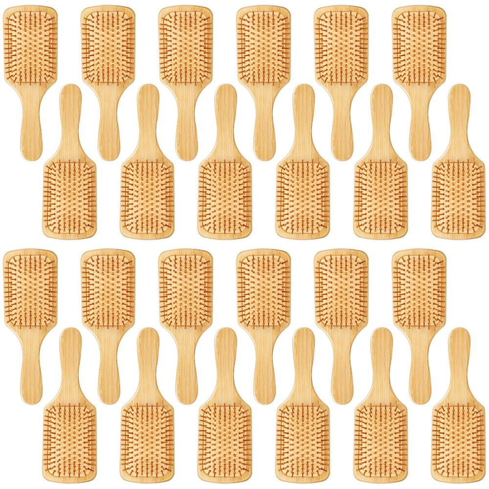 Wanmu ergonomic handle bamboo brush offers comfortable grip during styling.
