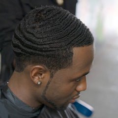 Hair displaying defined waves after WaveBuilder Cocoa & Shea Pomade styling.