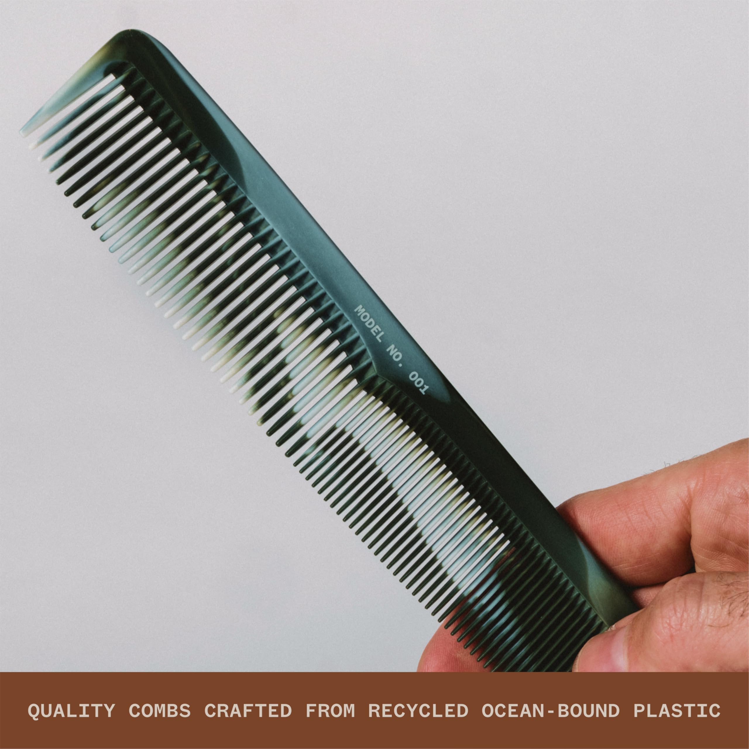 WAVEY hair comb side view in green showing portable travel-friendly design
