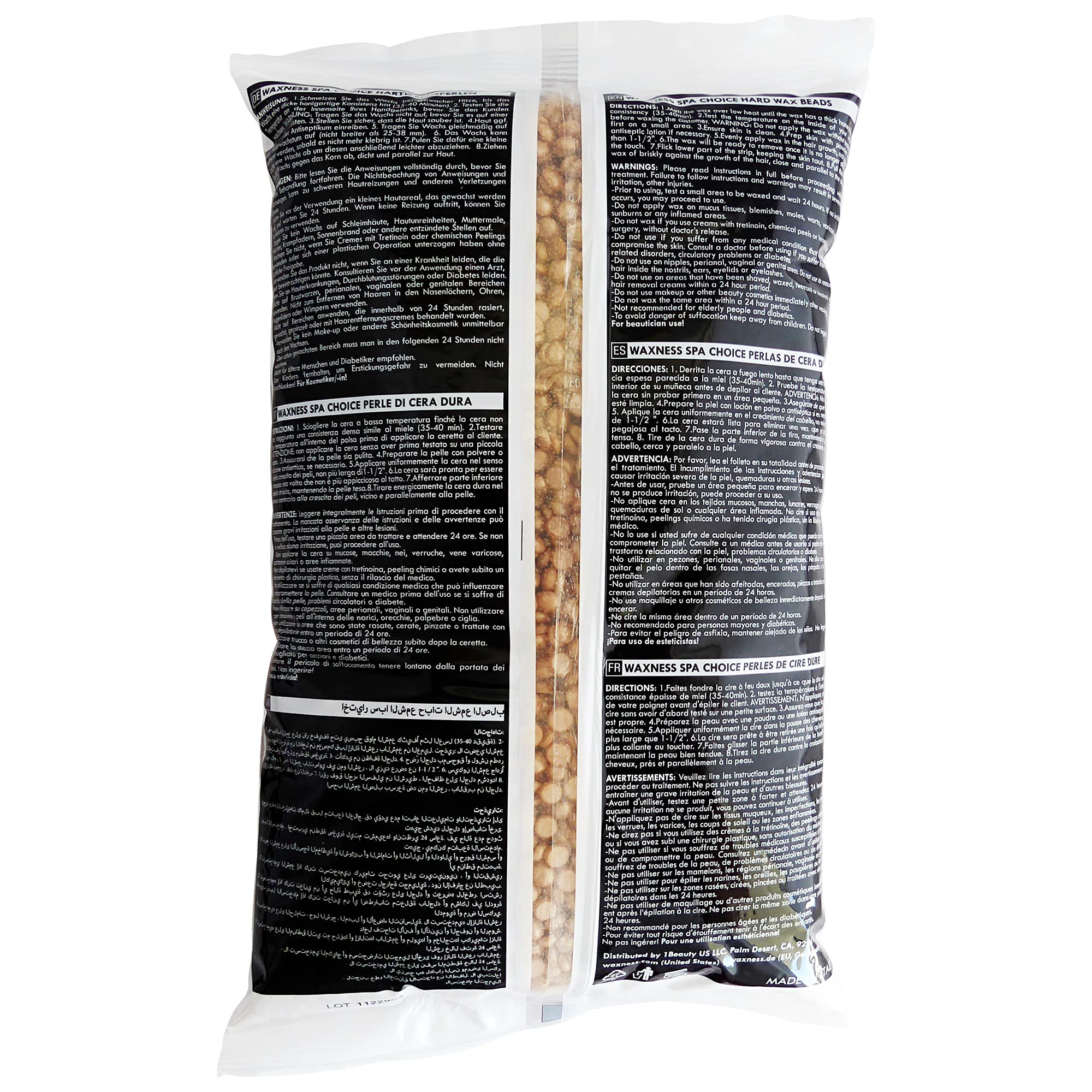 Close-up of Waxness Mineral Gold Demi Creamy Beads texture showing creamy consistency