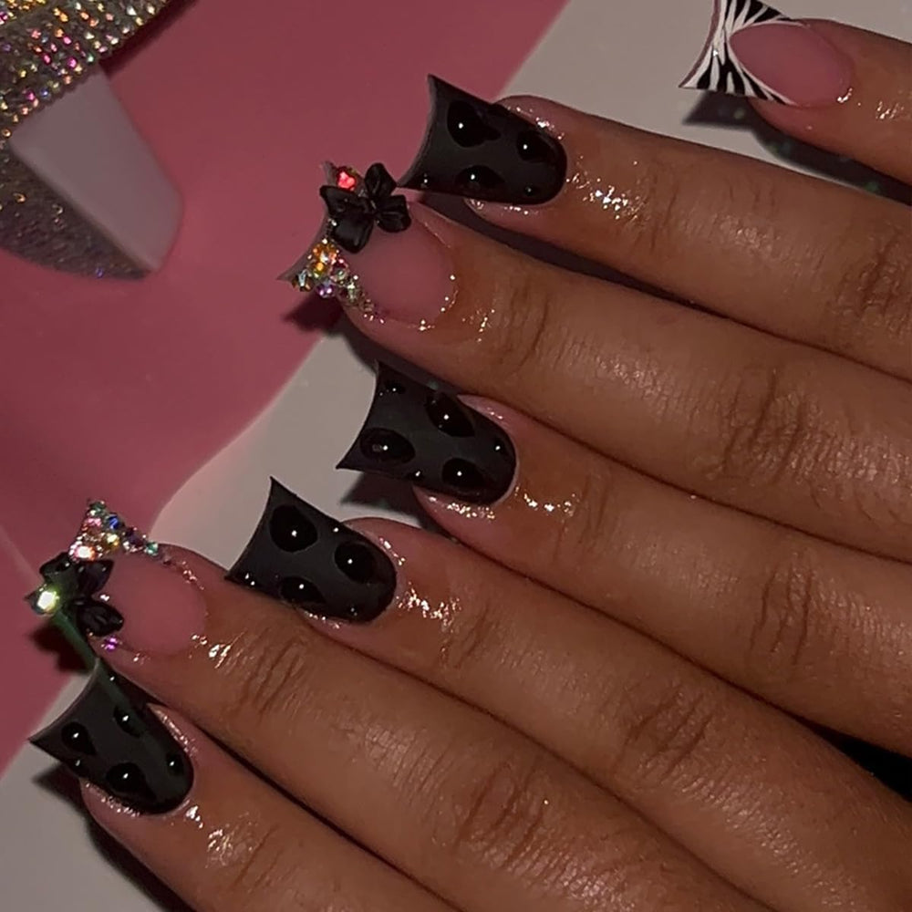 Uñas con lazo y cristales WBRRFJJ para un look glam
