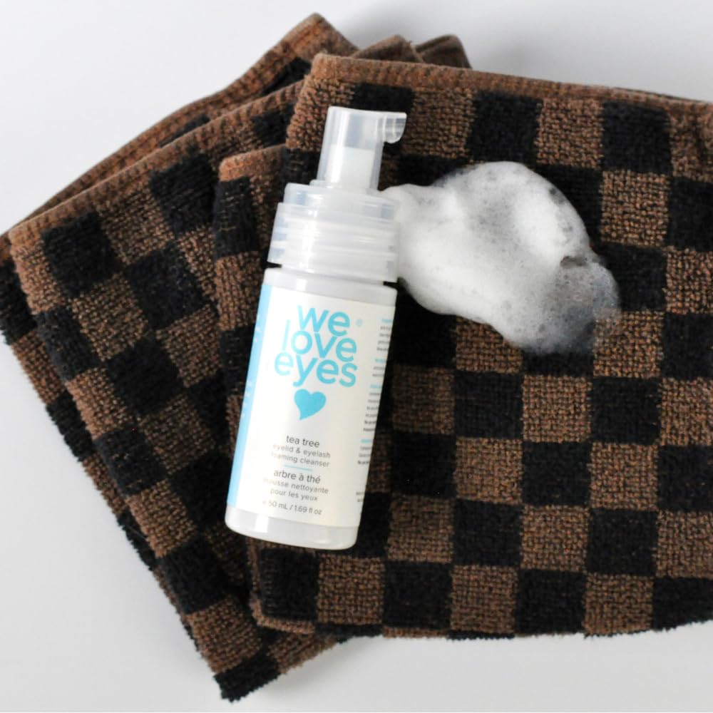 We Love Eyes Tea Tree Foaming Cleanser foam close-up illustrating rich lather for clean lids
