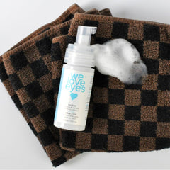 We Love Eyes Tea Tree Foaming Cleanser foam close-up illustrating rich lather for clean lids