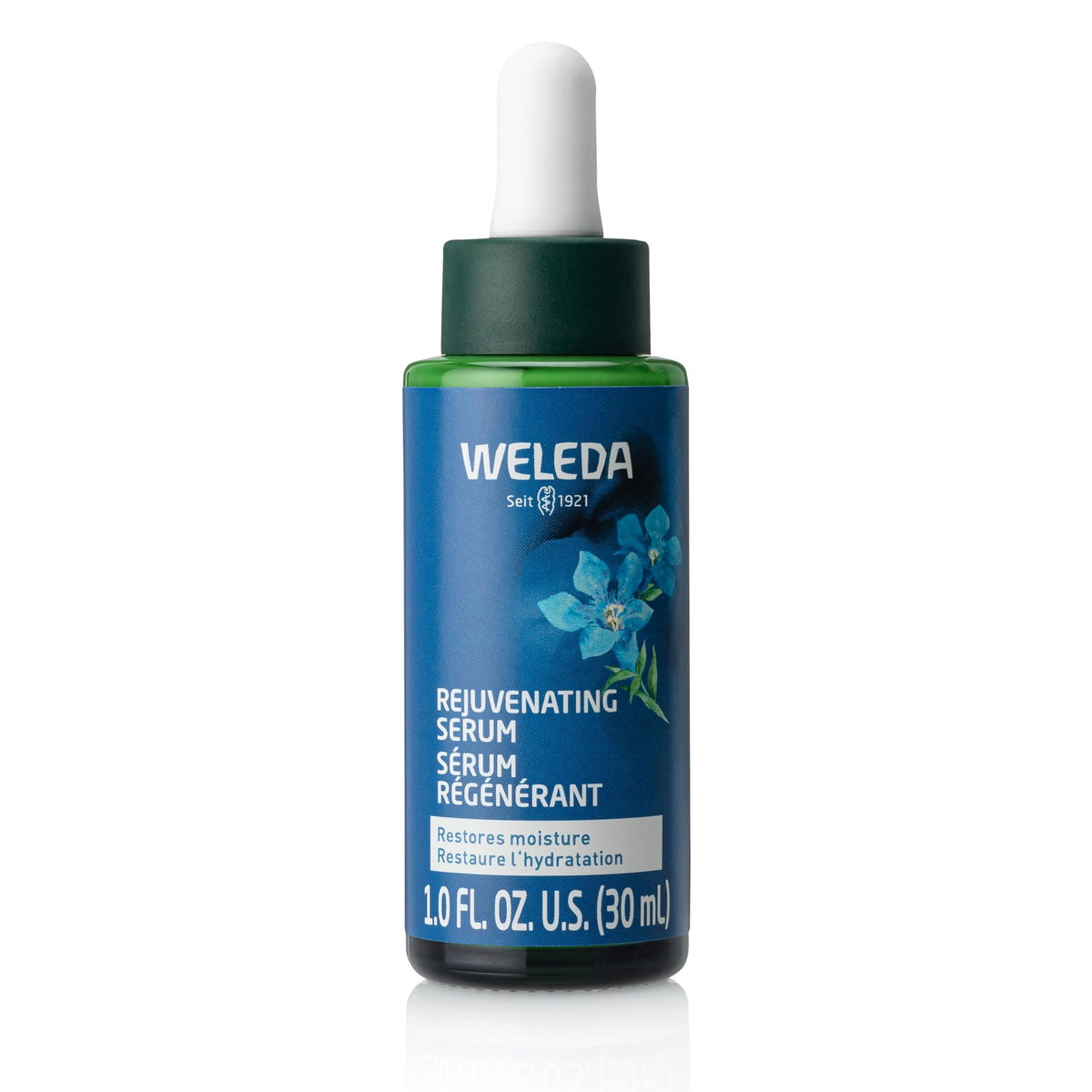 Weleda Rejuvenating Serum bottle close-up, showing plant-based nourishment.