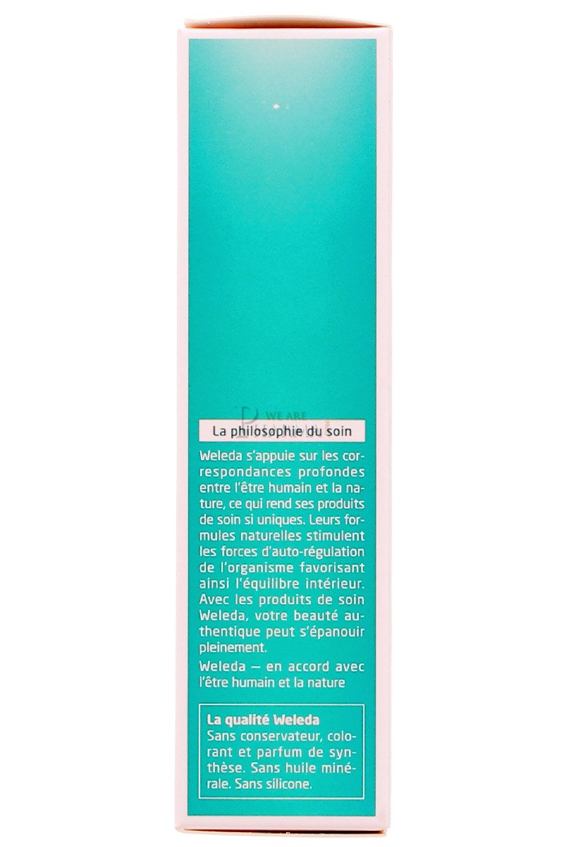 Weleda Rosemary Revitalising Hair Tonic application on hands for scalp massage