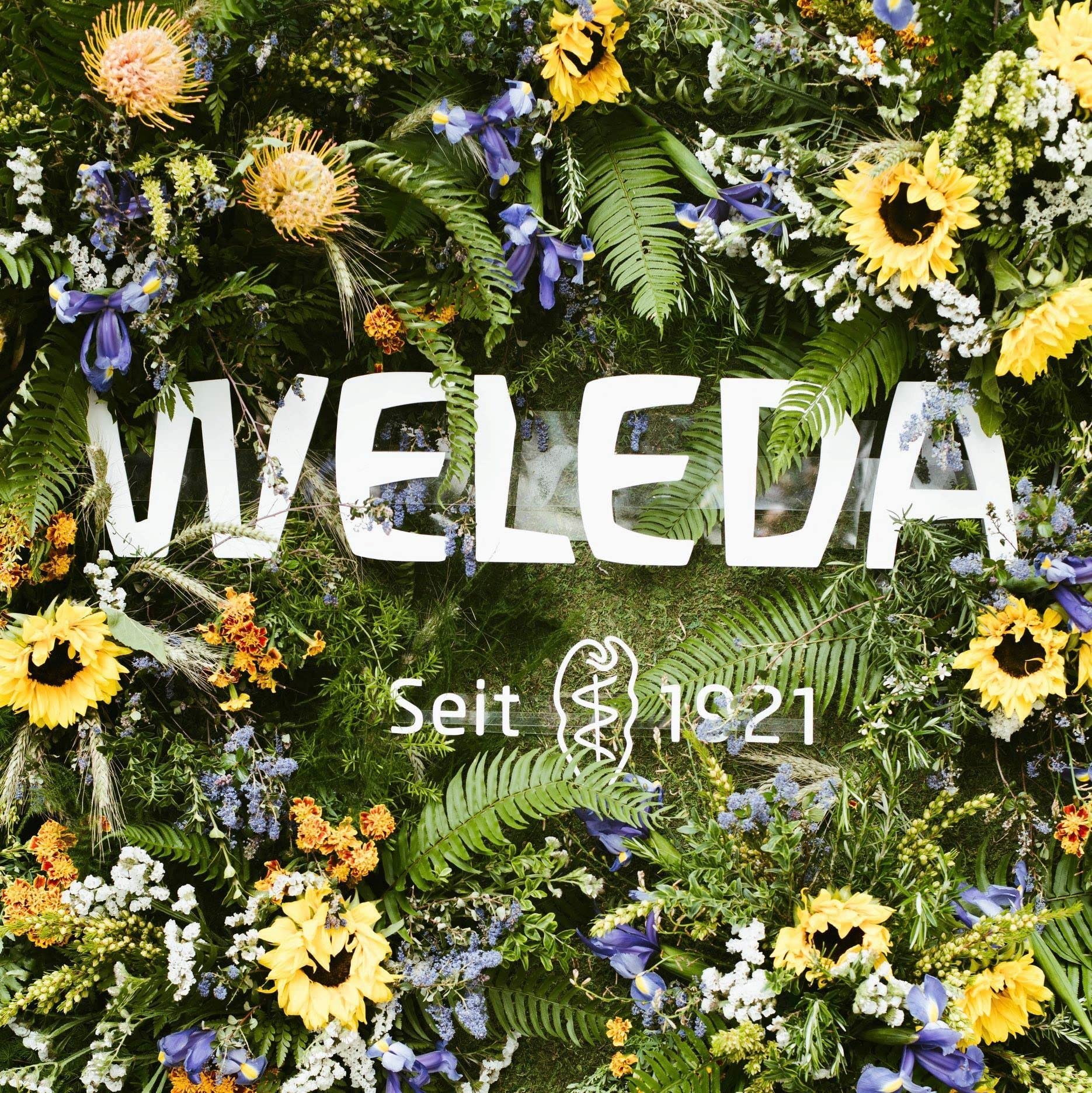 Weleda Skin Food Body Lotion paraben-free label visible on packaging.