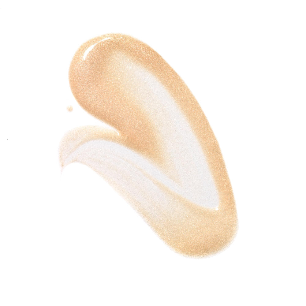 Swirl of Well People Bio Brightener Serum texture showing dewy glow.
