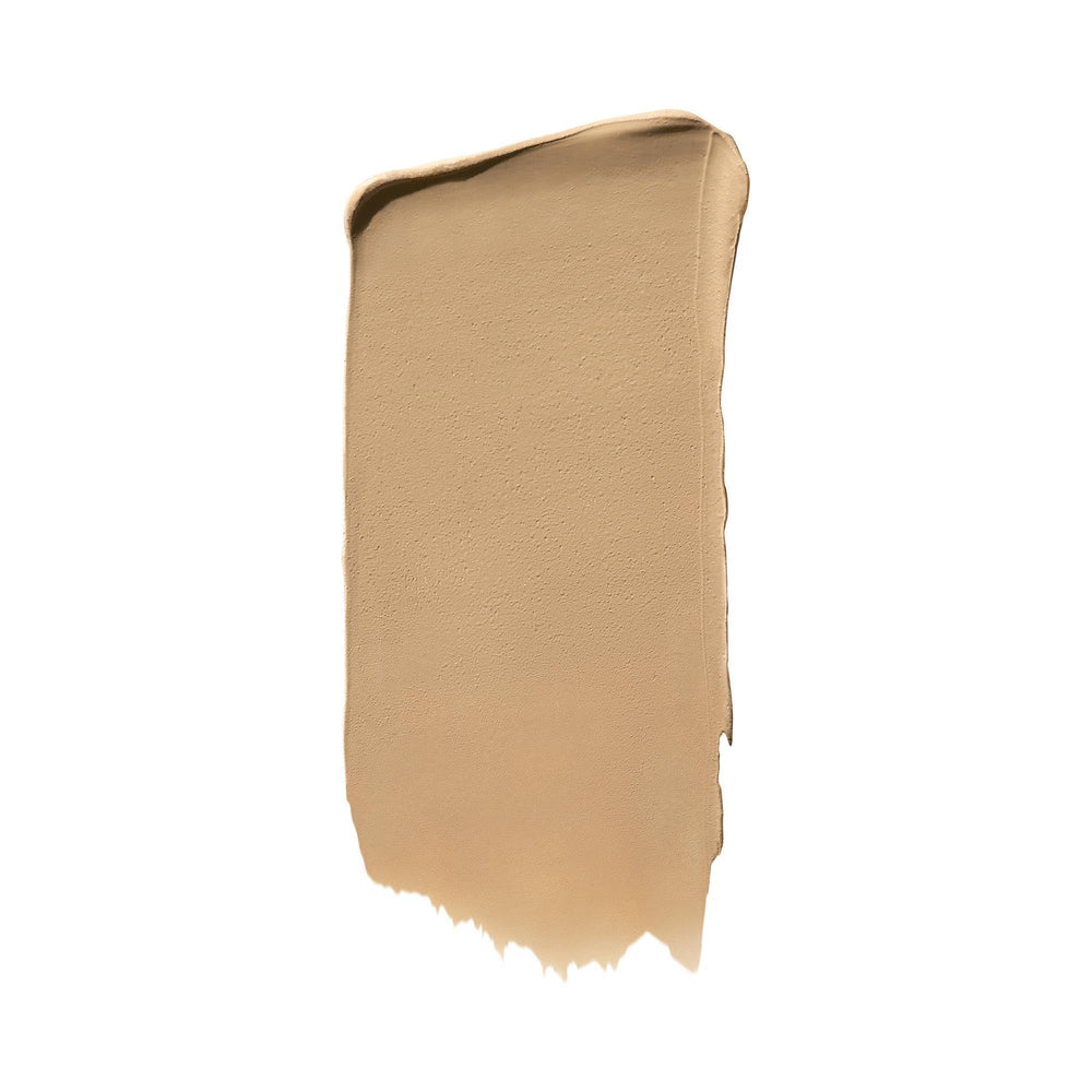 Well People Supernatural complexion stick applied to forehead for quick even tone