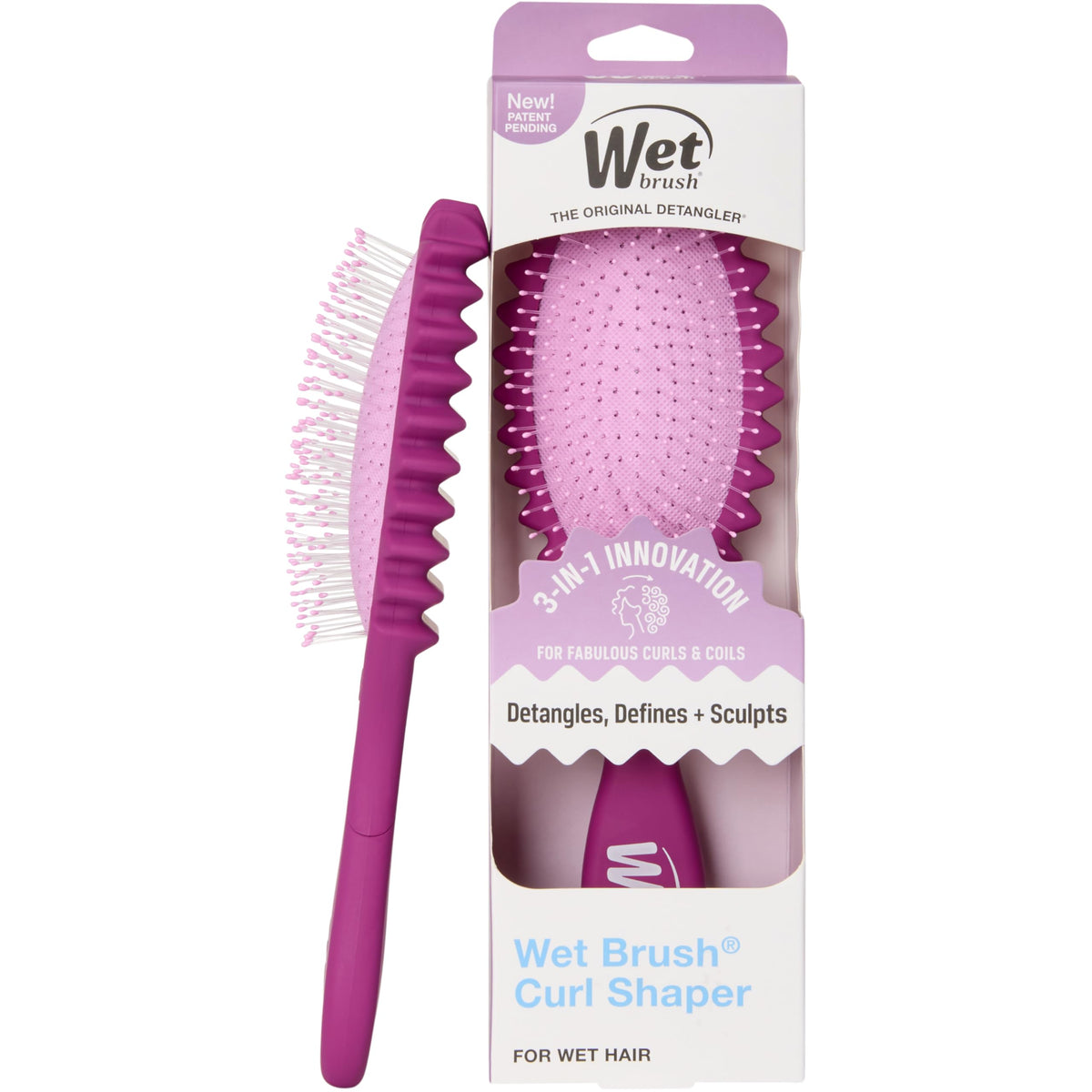 Wet Brush Curl Shaper in hand detangles wet curls gently for smooth styling.