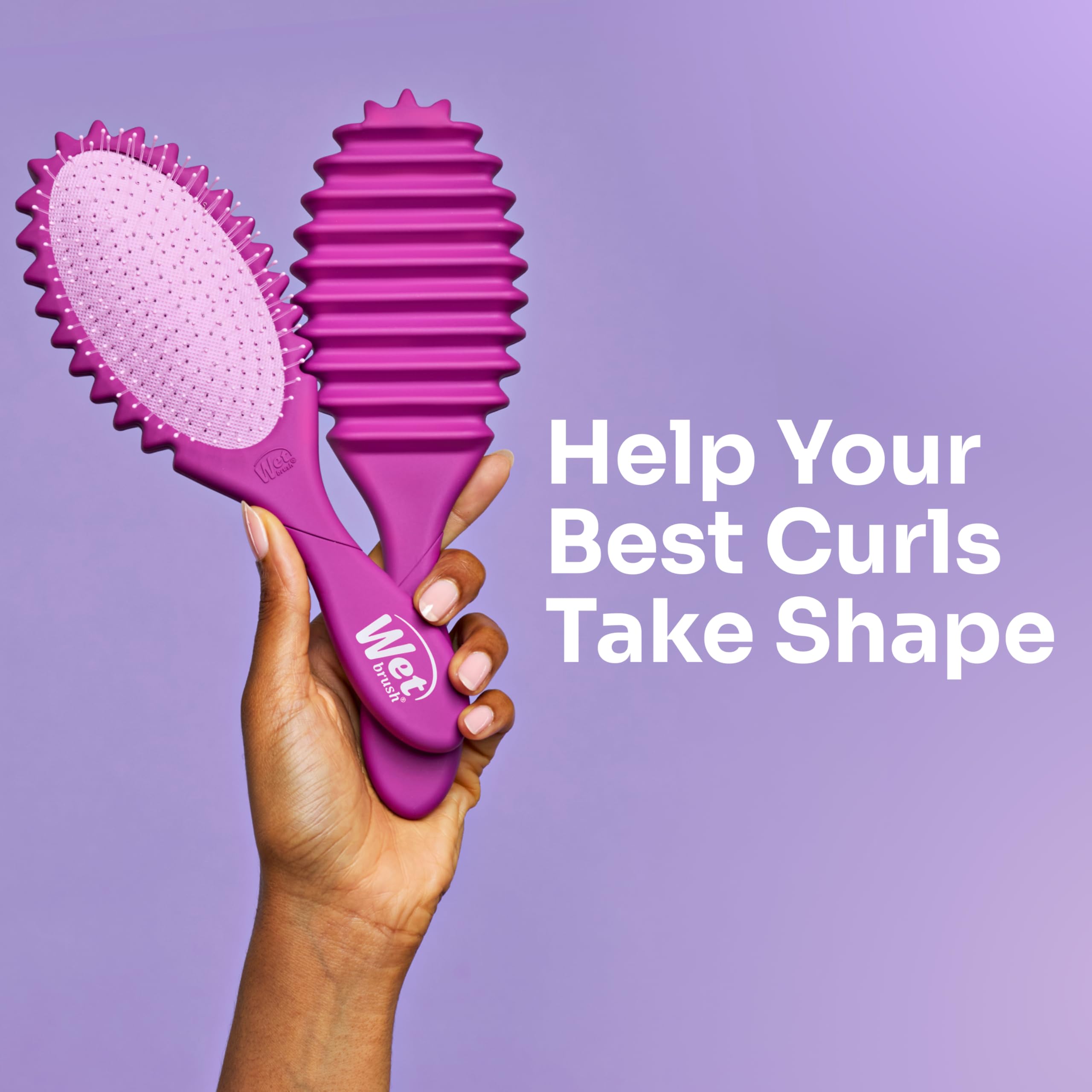 Wet Brush Curl Shaper demonstrating IntelliFlex bristles for gentle glide.