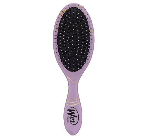 Wet Brush Jasmine detangler in use on wet hair for gentle detangling.