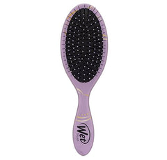 Wet Brush Jasmine detangler in use on wet hair for gentle detangling.