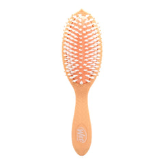 Wet Brush Go Green Coconut Oil brush front view, showcasing plant-based plastic construction for eco-friendly detangling.