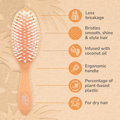 Plant-based plastic body of Wet Brush Go Green Coconut Oil emphasizes sustainable styling.