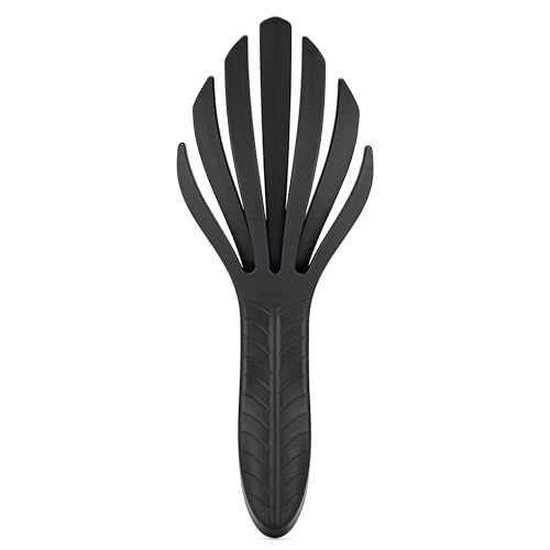 Go Green Curl Detangler flexible bristles close-up bending with curls