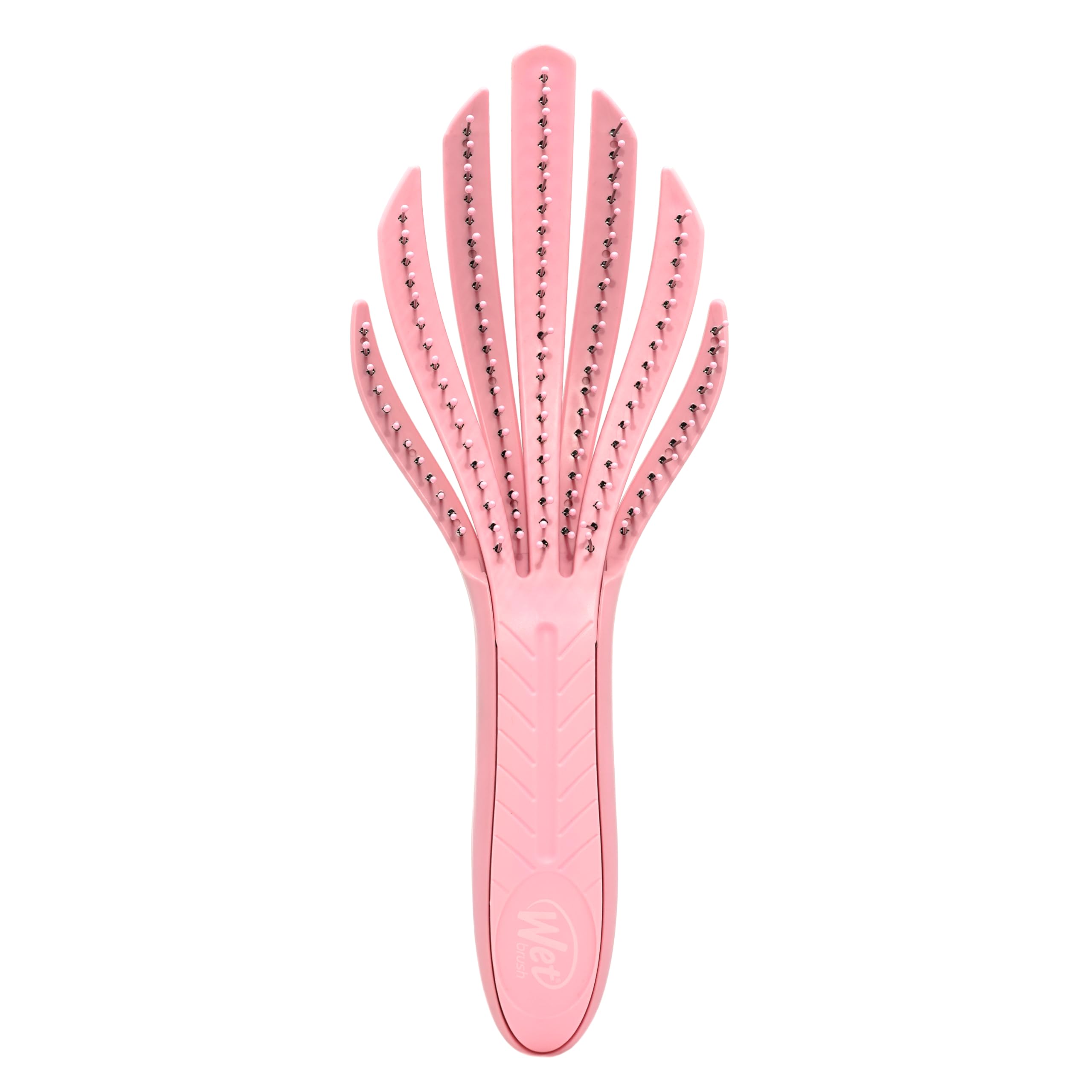 Wet Brush Go Green Curl Detangler in pale pink glides through curls for painless detangling.