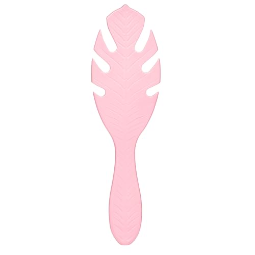 Close-up of IntelliFlex bristles gliding through tangles on pink Go Green brush