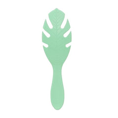 Wet Brush Go Green Detangler smooths dry tangles for quick styling.